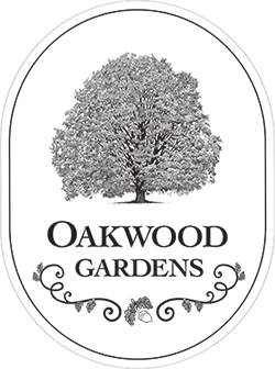 oakwood-gardens-logo-tall-oval-250